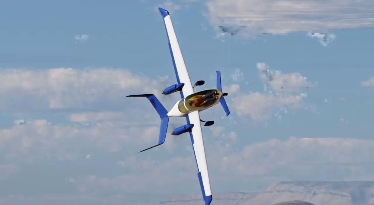 The CS-9 banking hard in simulated flight over desert cliffs
